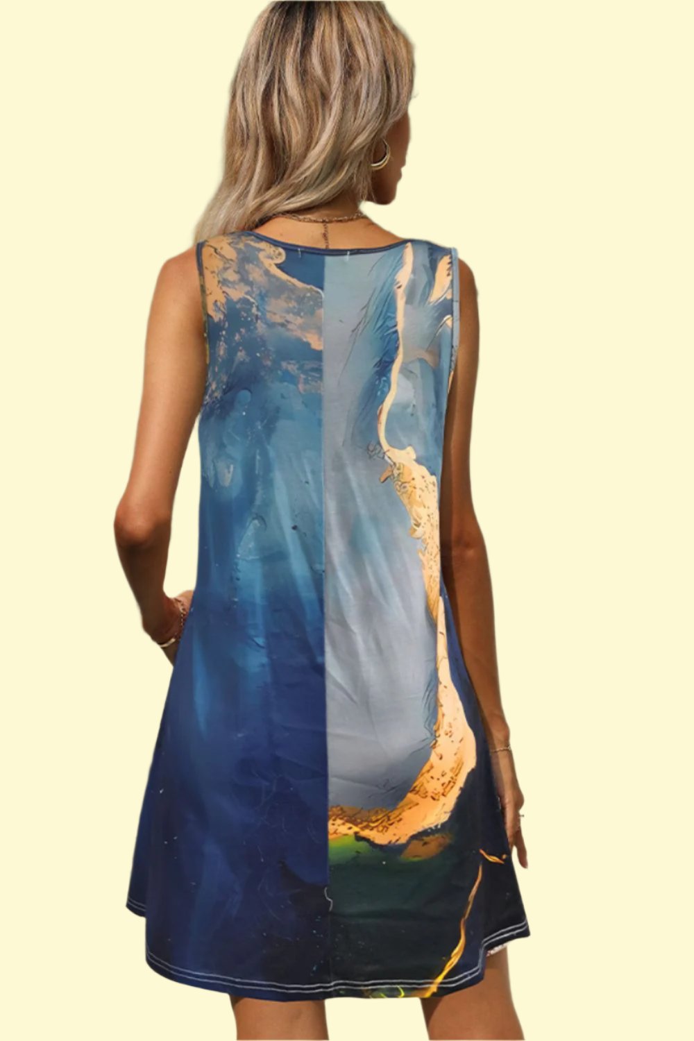 Back view of the dress, showcasing the flowy silhouette