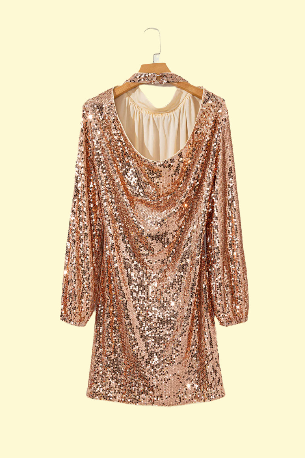 Daring backless sequin dress with mock neck