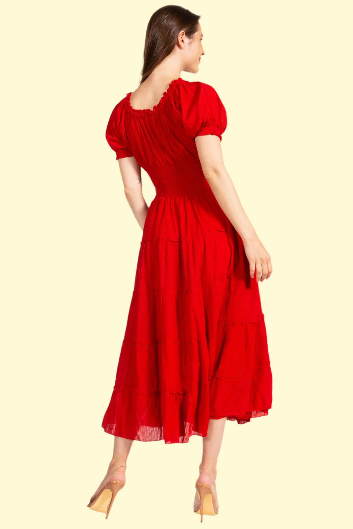 Model posing back side of Red Boho Dress