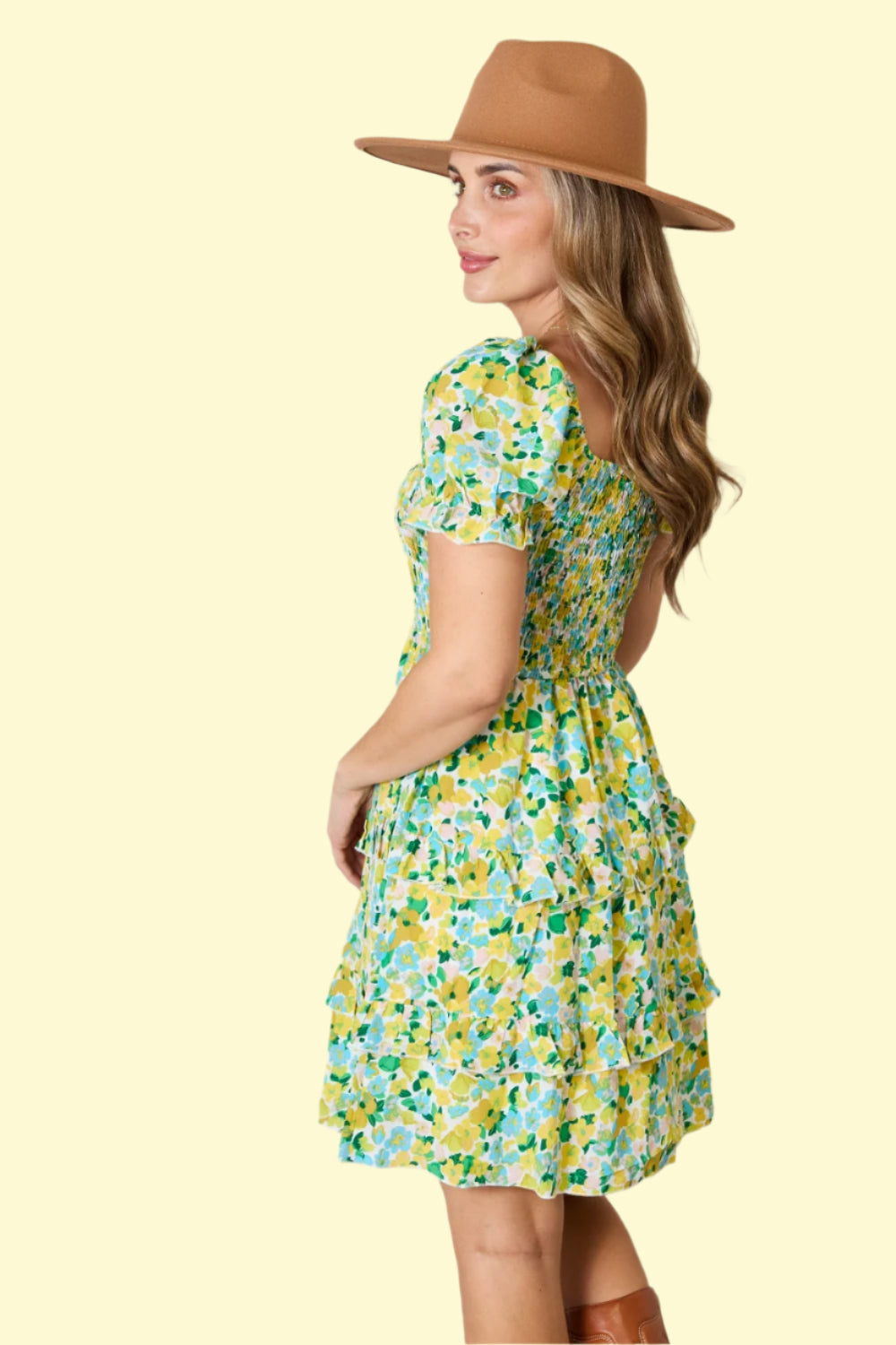 Flirty and playful smocked dress with sleeves