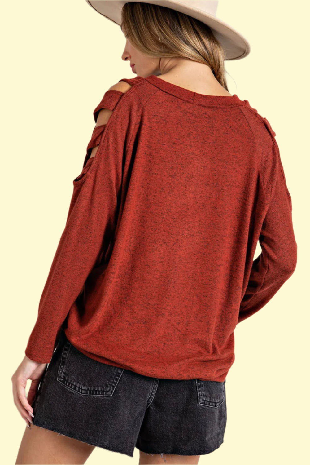 Trendy women’s rust cutout top