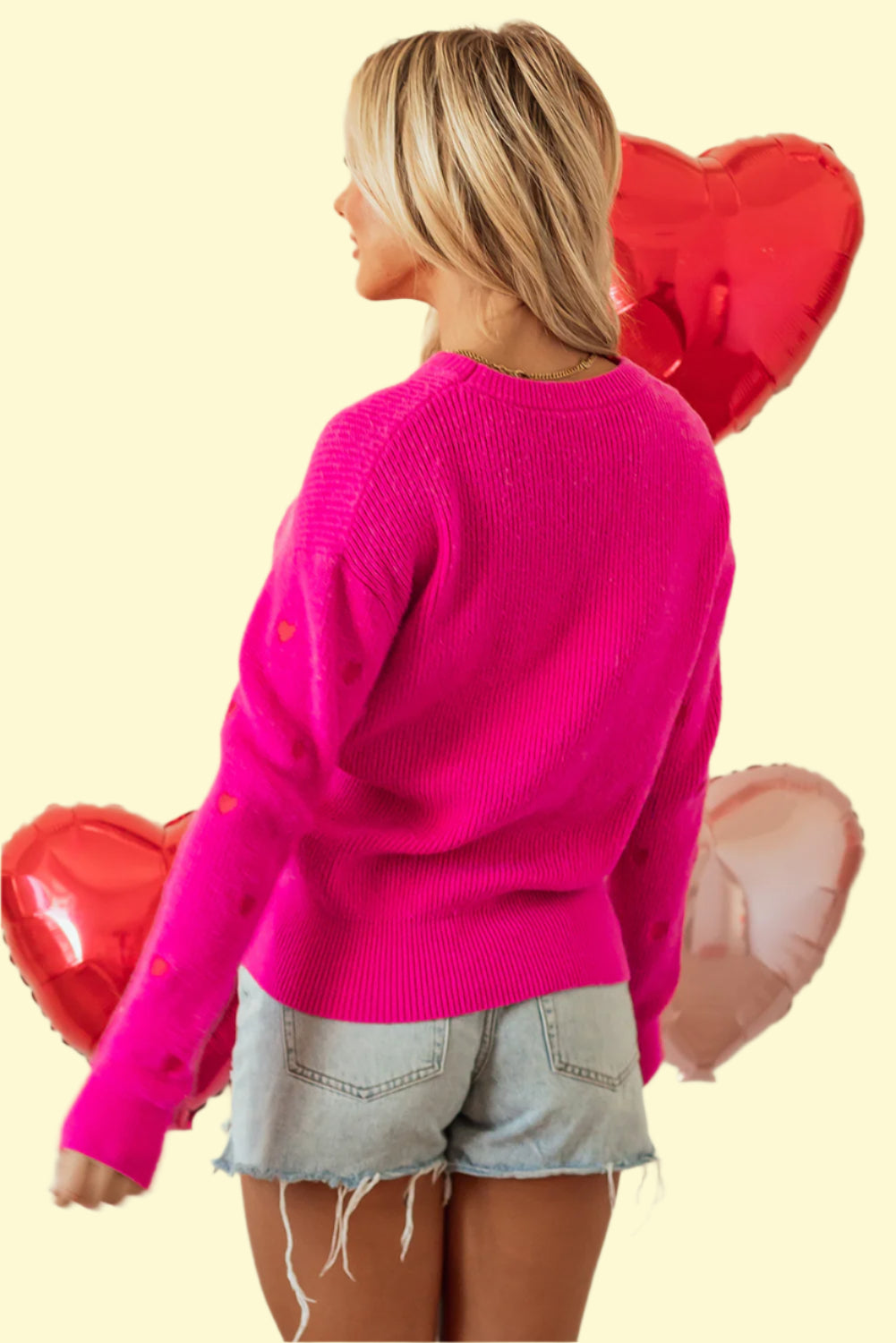 Women’s winter sweater with heart design